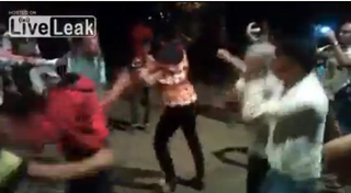 Illustration for article titled 'Gangnam Style' Wedding Dance With Gun Results In Horrible Bloodbath